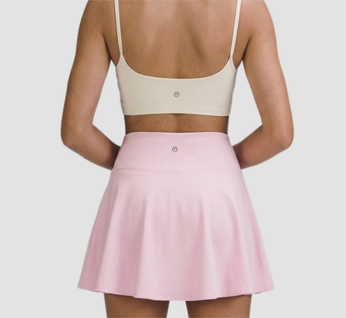 Falda deportiva cintura en v cruzada con bolsillos