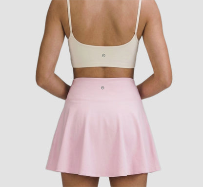 Falda deportiva cintura en v cruzada con bolsillos