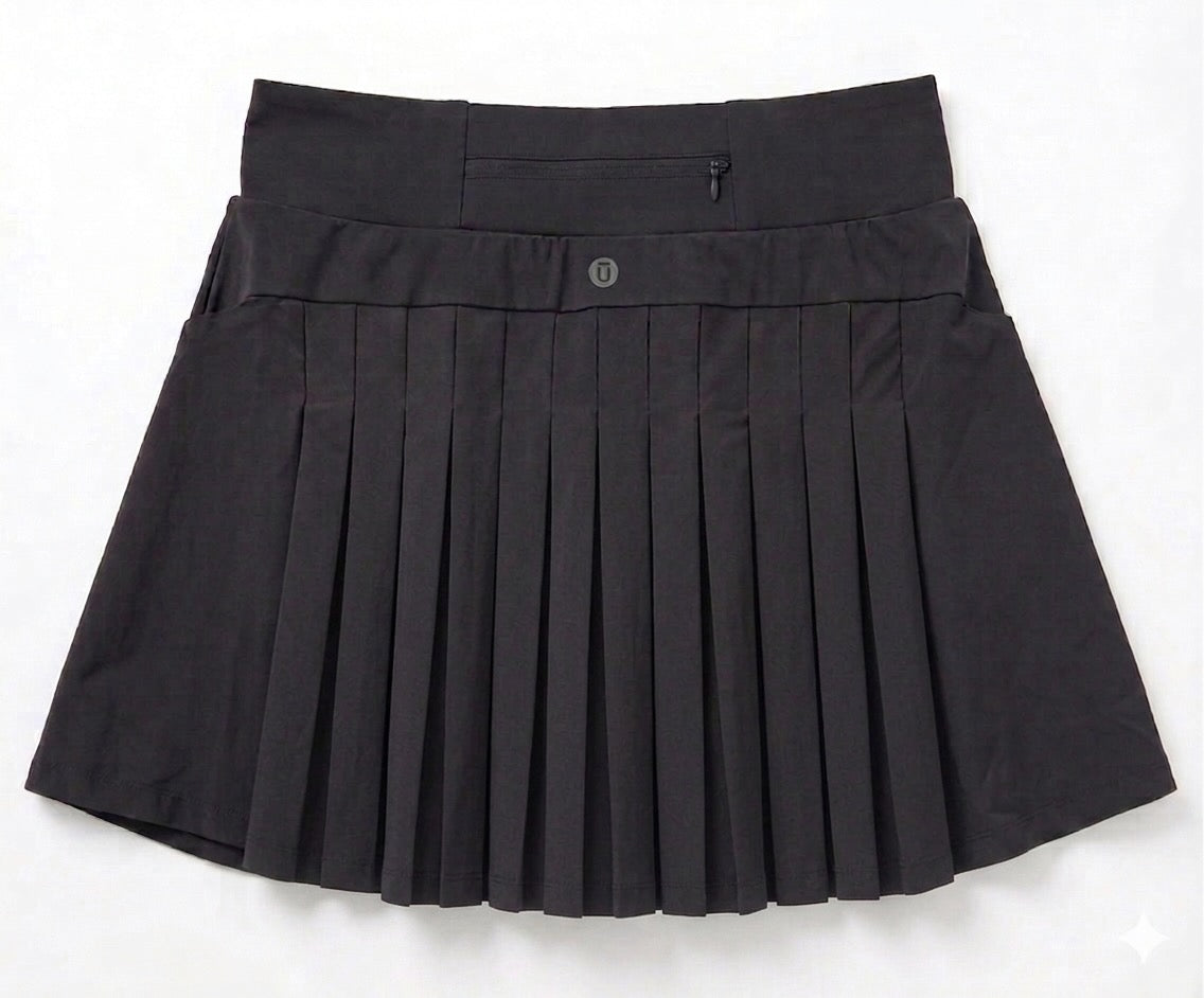 Falda deportiva plisada con bolsillo trasero