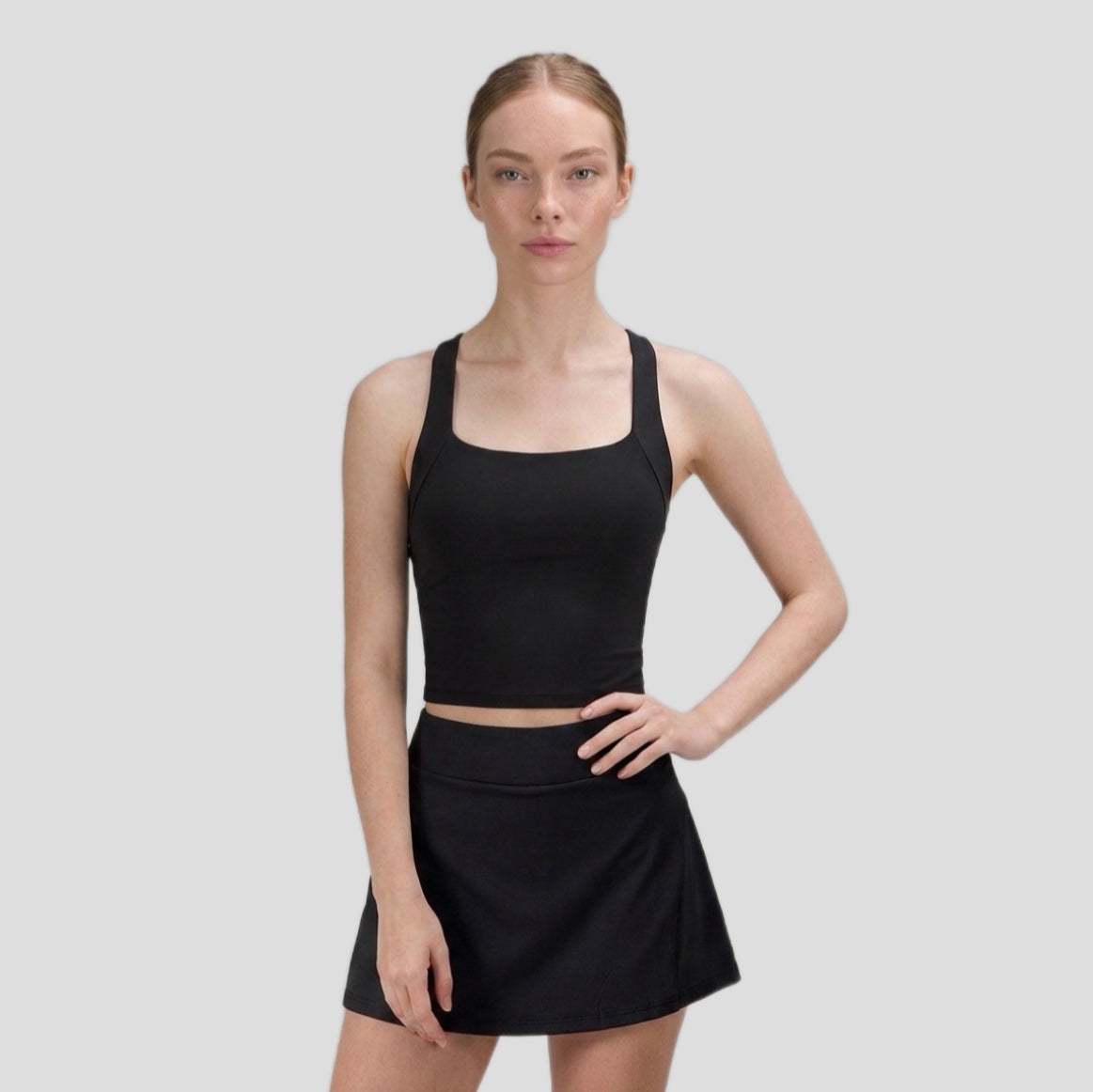 Falda deportiva plisada con bolsillo trasero