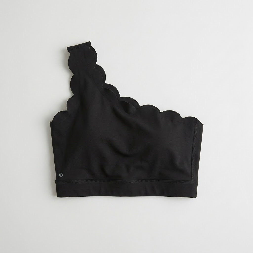 Asymmetric wave sports top