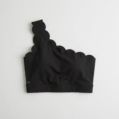 Asymmetric wave sports top
